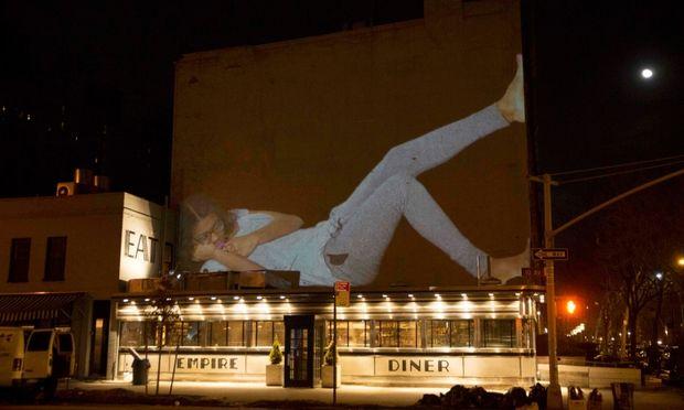An image projected on a building as part of Projection Napping.