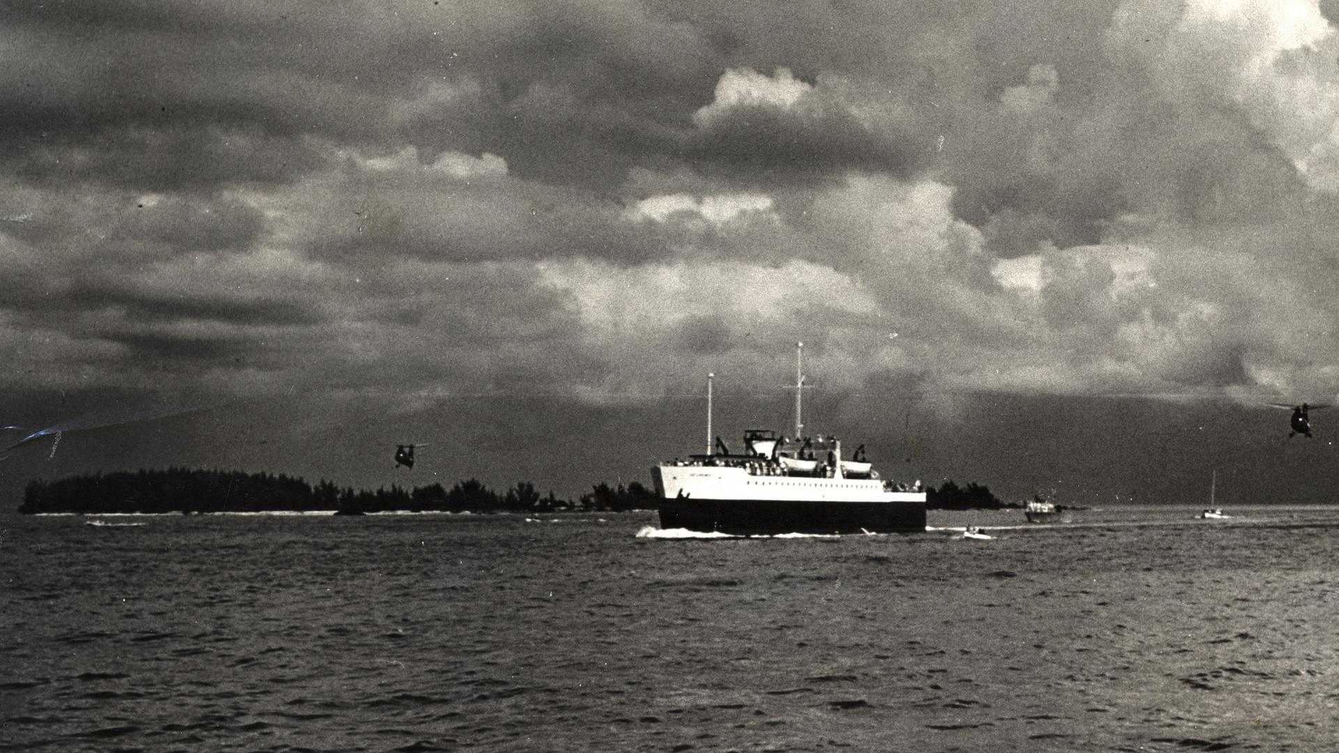 A leaves the city of Key West on a trip to Cuba in October 1954.