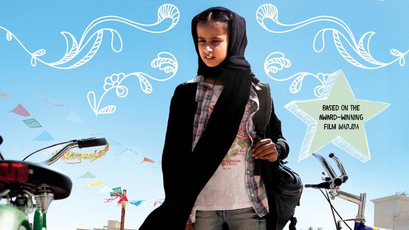 Wadjda looks at her desire, a bicycle, on the book cover for Haifaa al-Mansour's the new young adult novel, "The Green Bicycle."