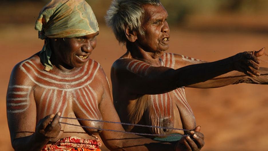 Aboriginal women from the remote Central Australian community of Ampilatwatja performing at a public ceremony in 2010 to protest against the Northern Territory intervention.