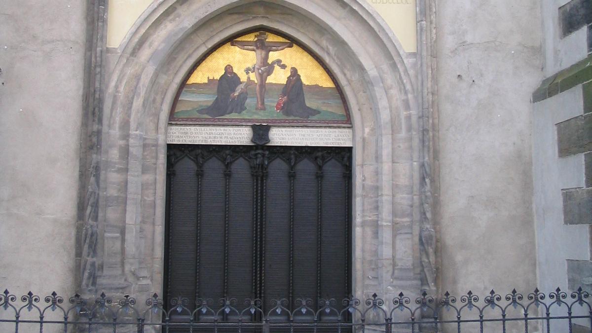 The door on the side of All Saints' Church in Wittenberg, Germany. In 1517, Martin Luther nailed his 95 Theses here sparking the Reformation. The original door was destroyed in a fire, but this black bronze door marks the historical spot.