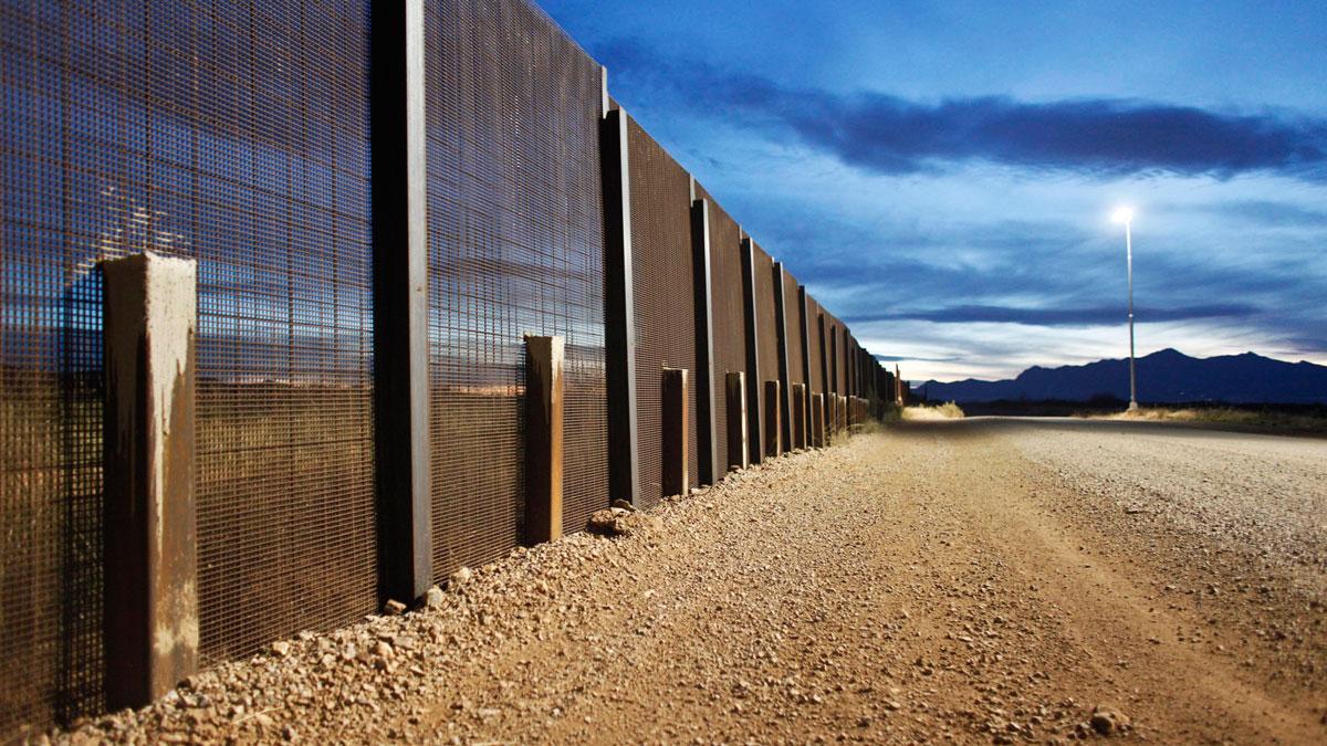 The Arizona-Mexico border fence is seen near Naco, Arizona.