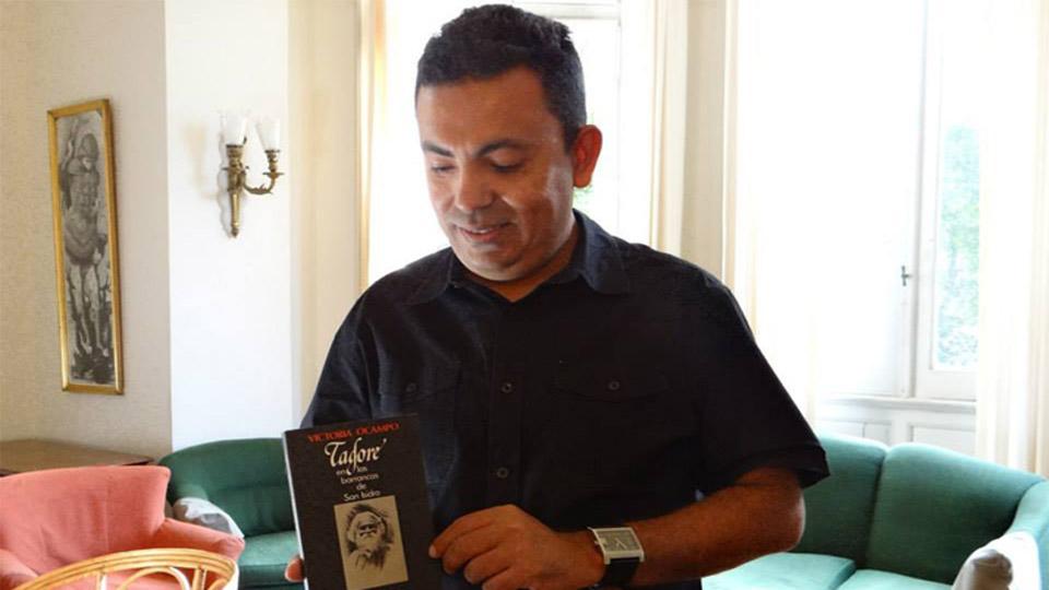 A photo of Bangladeshi American blogger, Avijit Roy, last year holding a book on Rabindranath Tagore. Roy blogged about scientific thought and apathy towards religion, taboo subjects in his home country of Bangladesh.