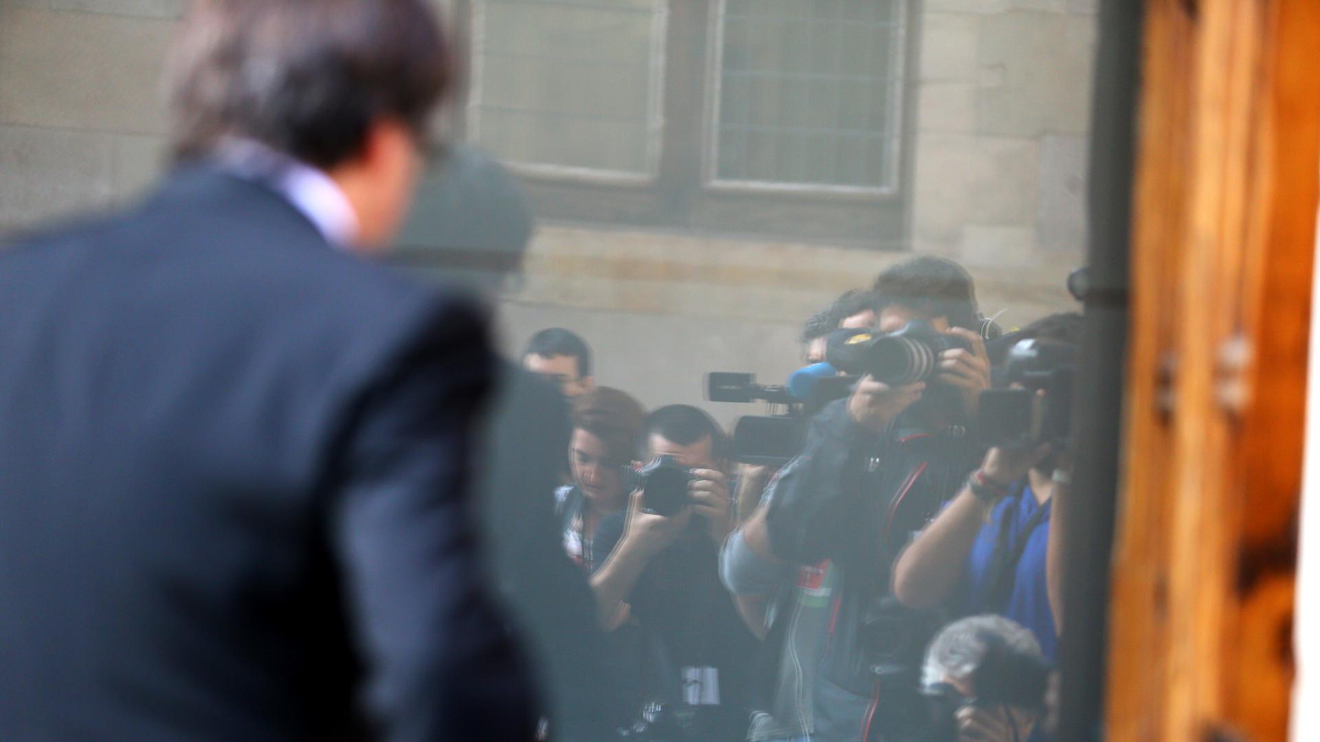 Catalan President Carles Puigdemont arrives for a cabinet meeting at the regional government headquarters in Barcelona, October 10, 2017.