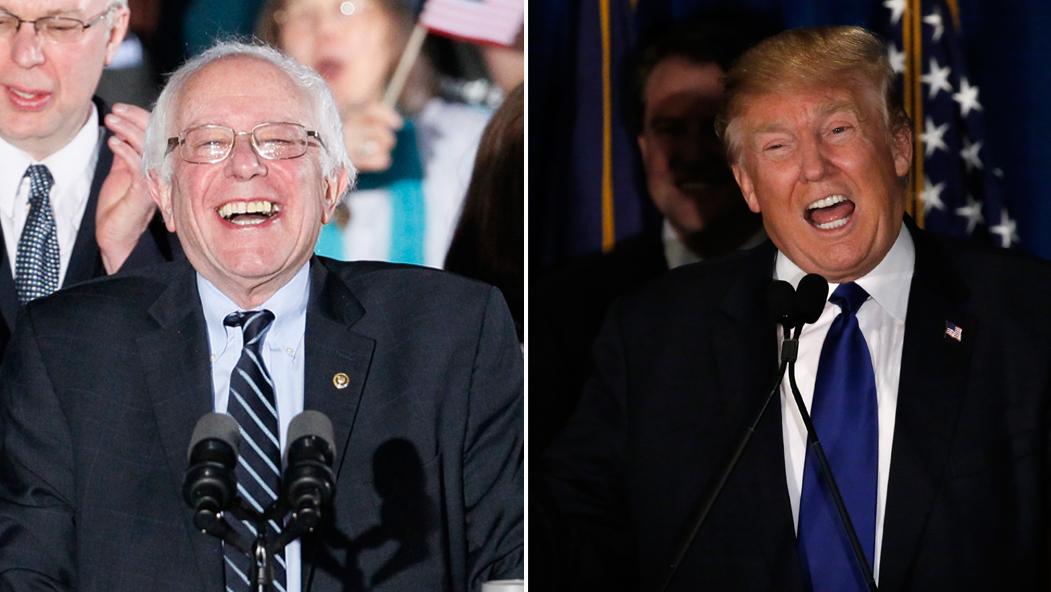 Democratic presidential candidate Bernie Sanders (L) and Republican presidential candidate Donald Trump after winning the 2016 New Hampshire primaries. 
