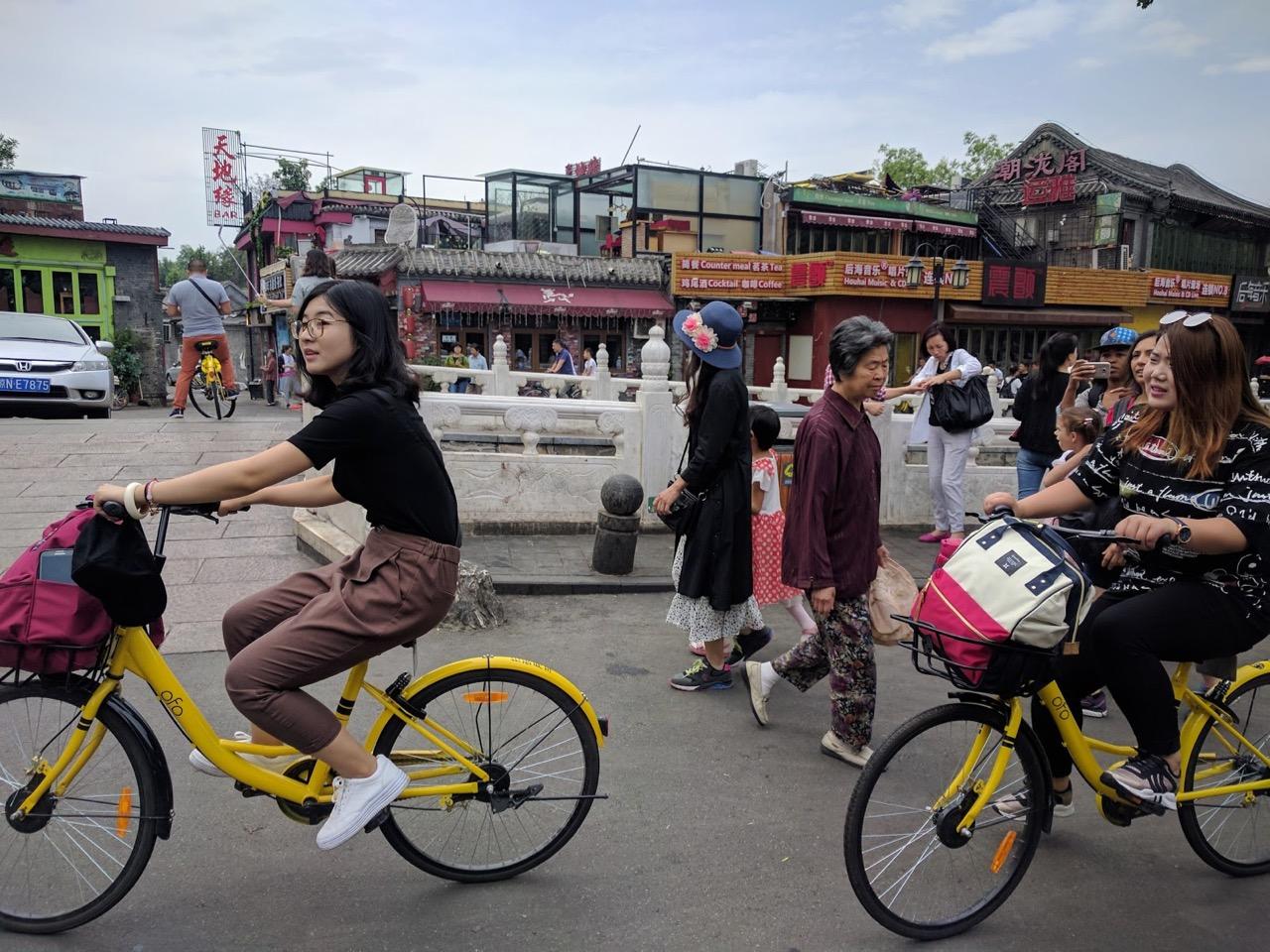 Riding bicycles in Beijing's Houhai neighborhood