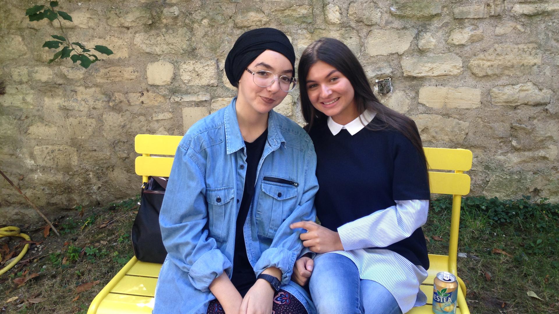 Sirine Bidjou (right) and Hanifa Benrahou (left) are both students at Sciences Po, which they entered through the CEP program. It's France's answer to American-style affirmative action.