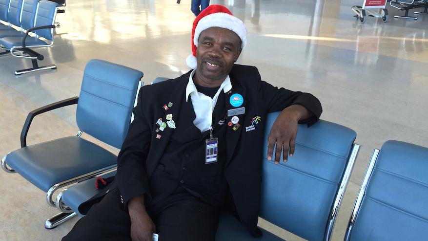 Ivan Watson greets travelers at Toronto's Pearson Airport with a smile, and often a song. It's not what you usually get as you wait to get through airport security.