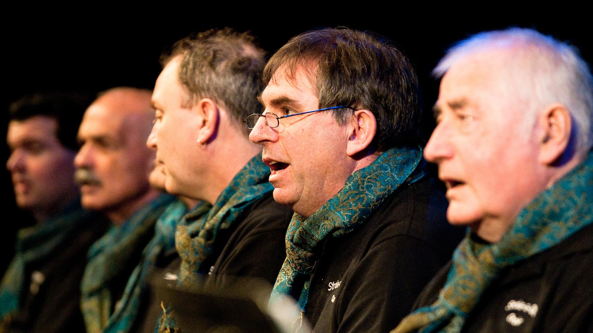 Tim Adams (center, in glasses) suffered a stroke several years ago that affected his ability to speak. But he's been singing with the Stroke a Chord choir outside of Melbourne, Australia.