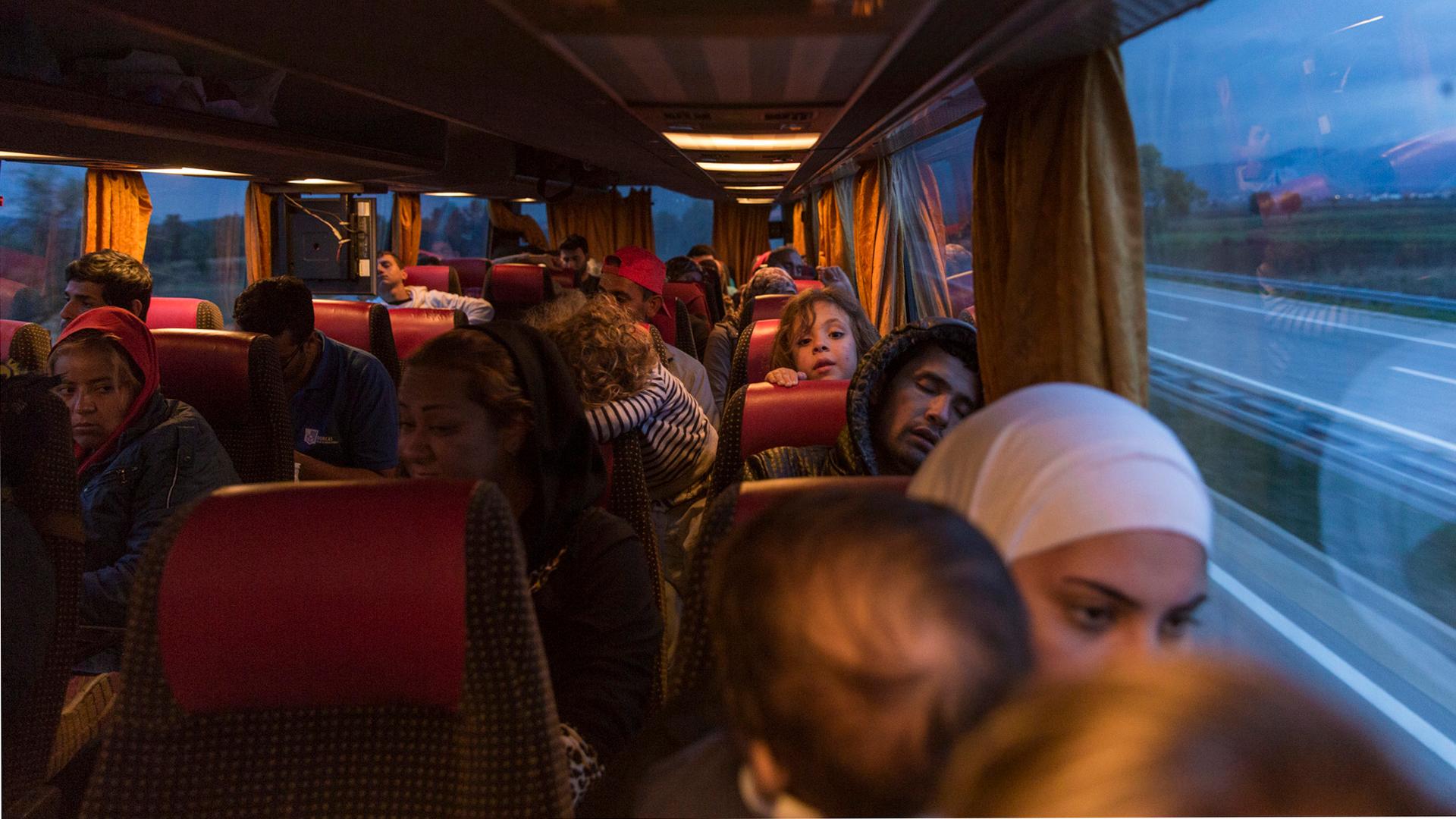 Refugees on a private bus in Serbia en route to the border with Croatia. 