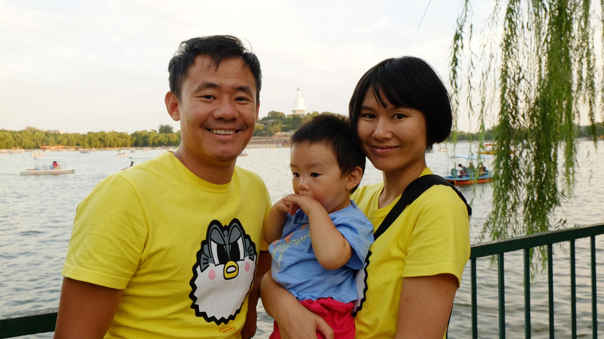 Xiyue Wang and Hua Qu with their son. Wang has been in prison in Iran for more than a year.