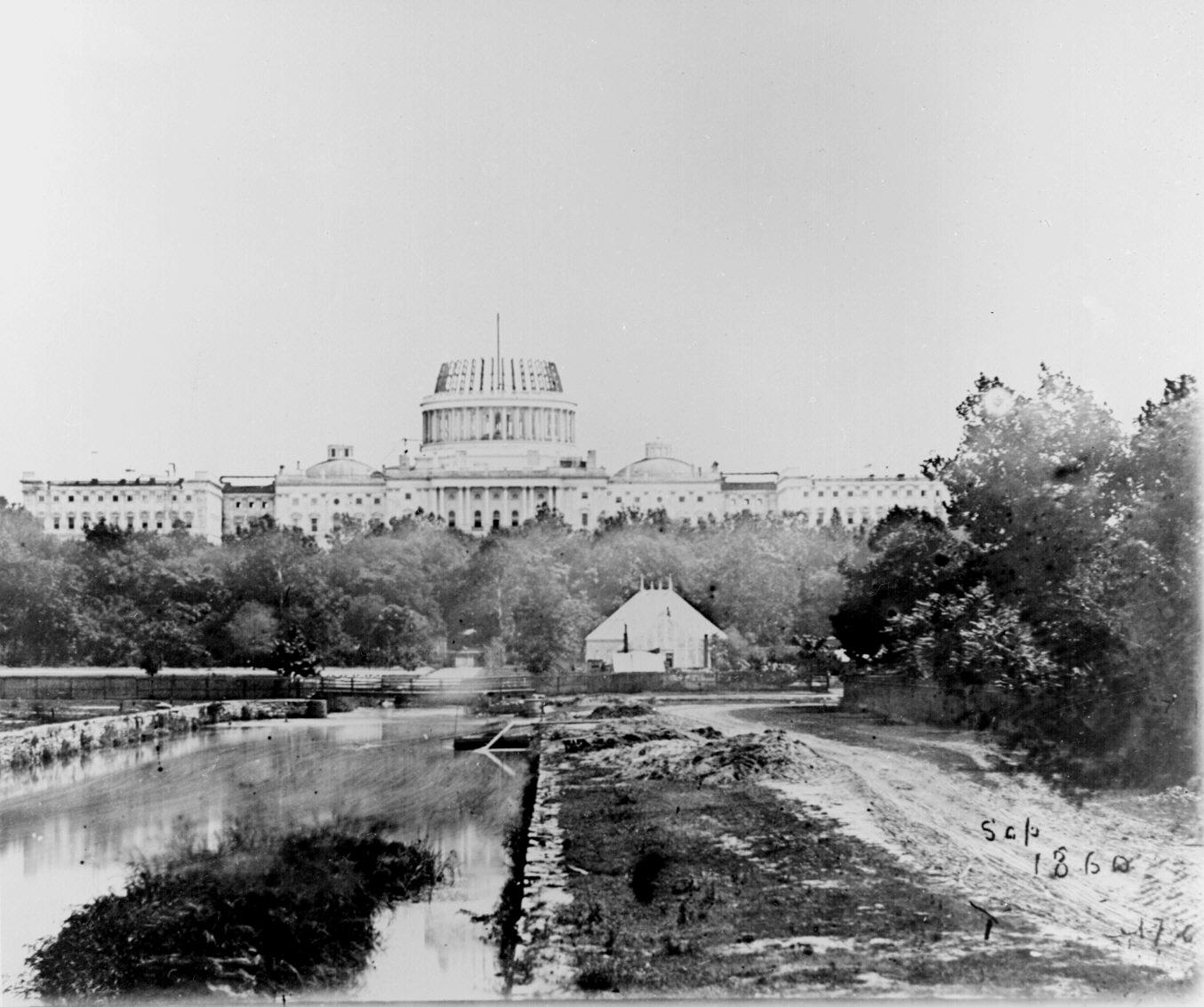 The US Capitol building is shown under construction in 1860. President Abraham Lincoln directed that work continue through the Civil War.