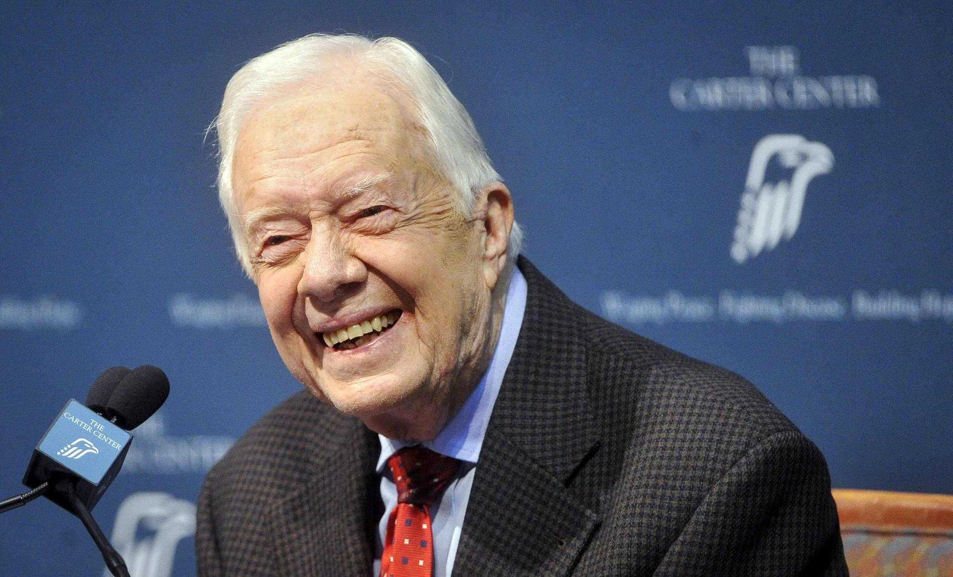 Former President Jimmy Carter takes questions from the media during a news conference about his recent cancer diagnosis and treatment plans, at the Carter Center in Atlanta. Carter, 90, said he will cut back dramatically on his schedule to receive treatme