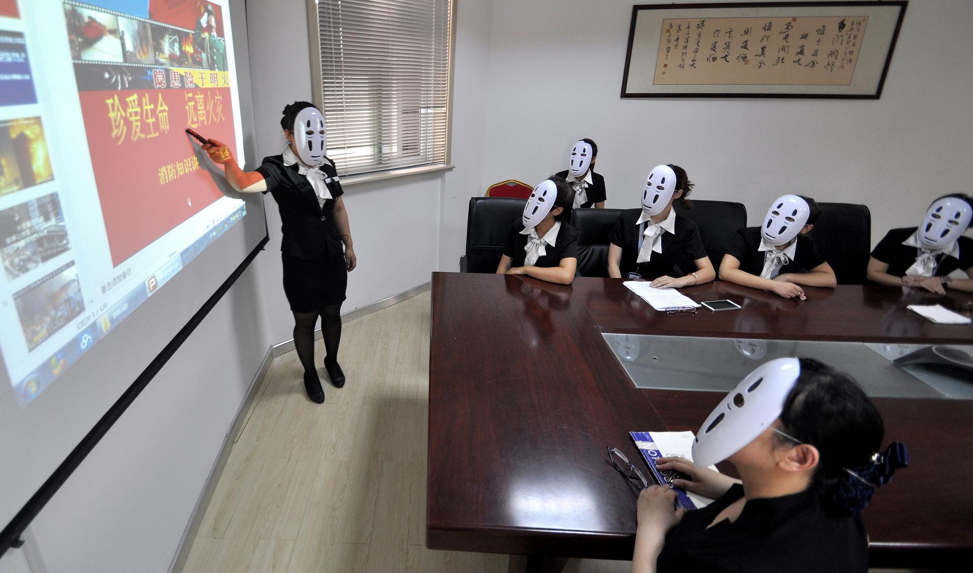 Staffs Wear No-Face Masks To Reduce Pressure During Working Time In Handan, Hebei, China
