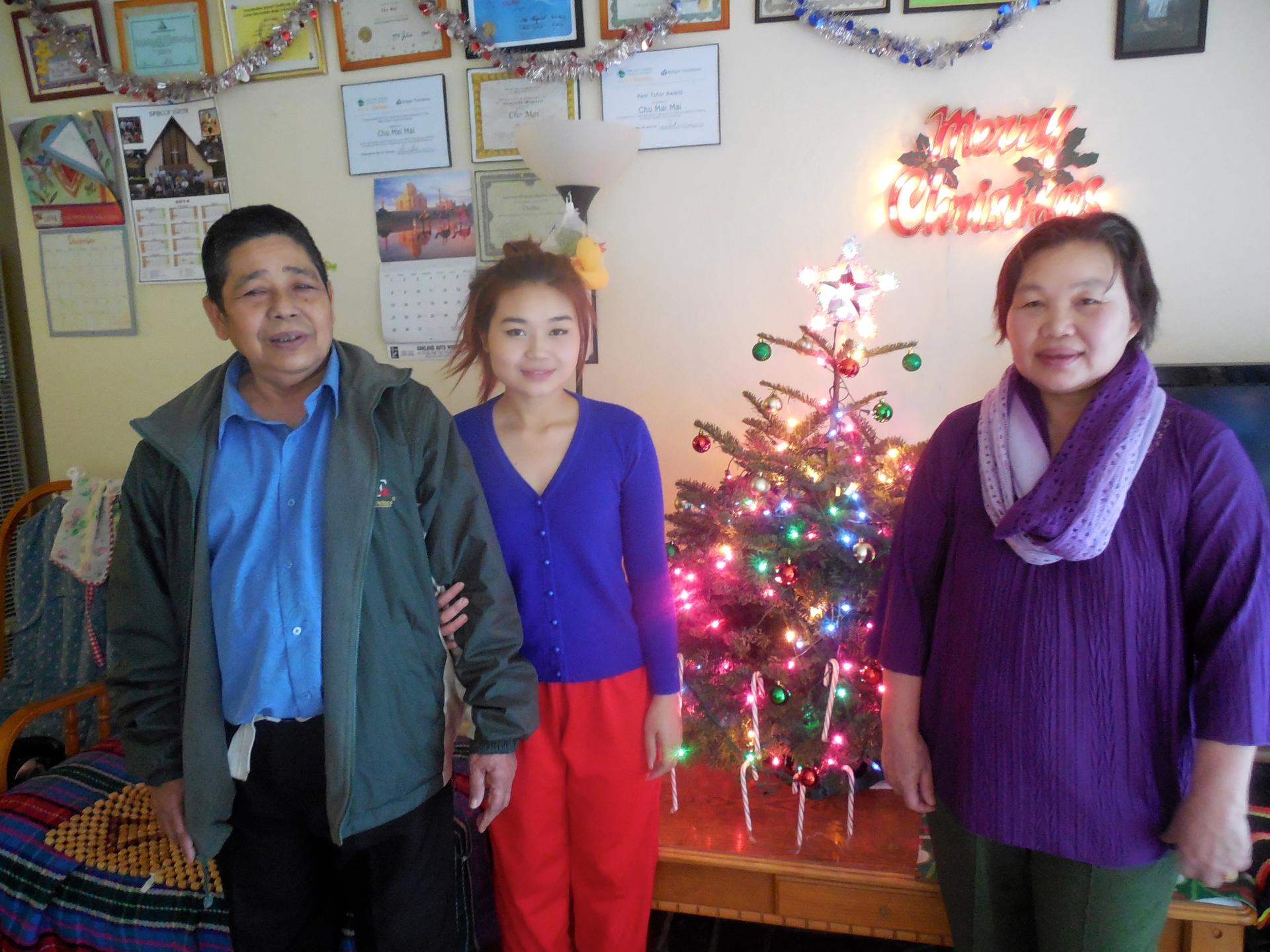 Cho Mei and her parents, refugees from Burma, bought their first Christmas tree this year. Mei says she's even participating in a 'Secret Santa' gift exchange with her family-- something she learned from her Burmese church group in Oakland.