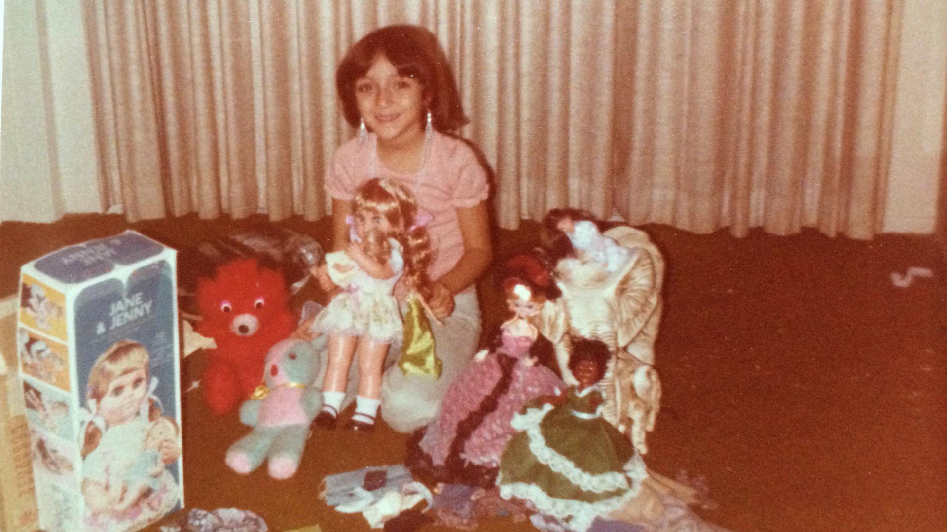 Eight-year-old Susan Cruz enjoying her first Christmas in the United States in 1978.