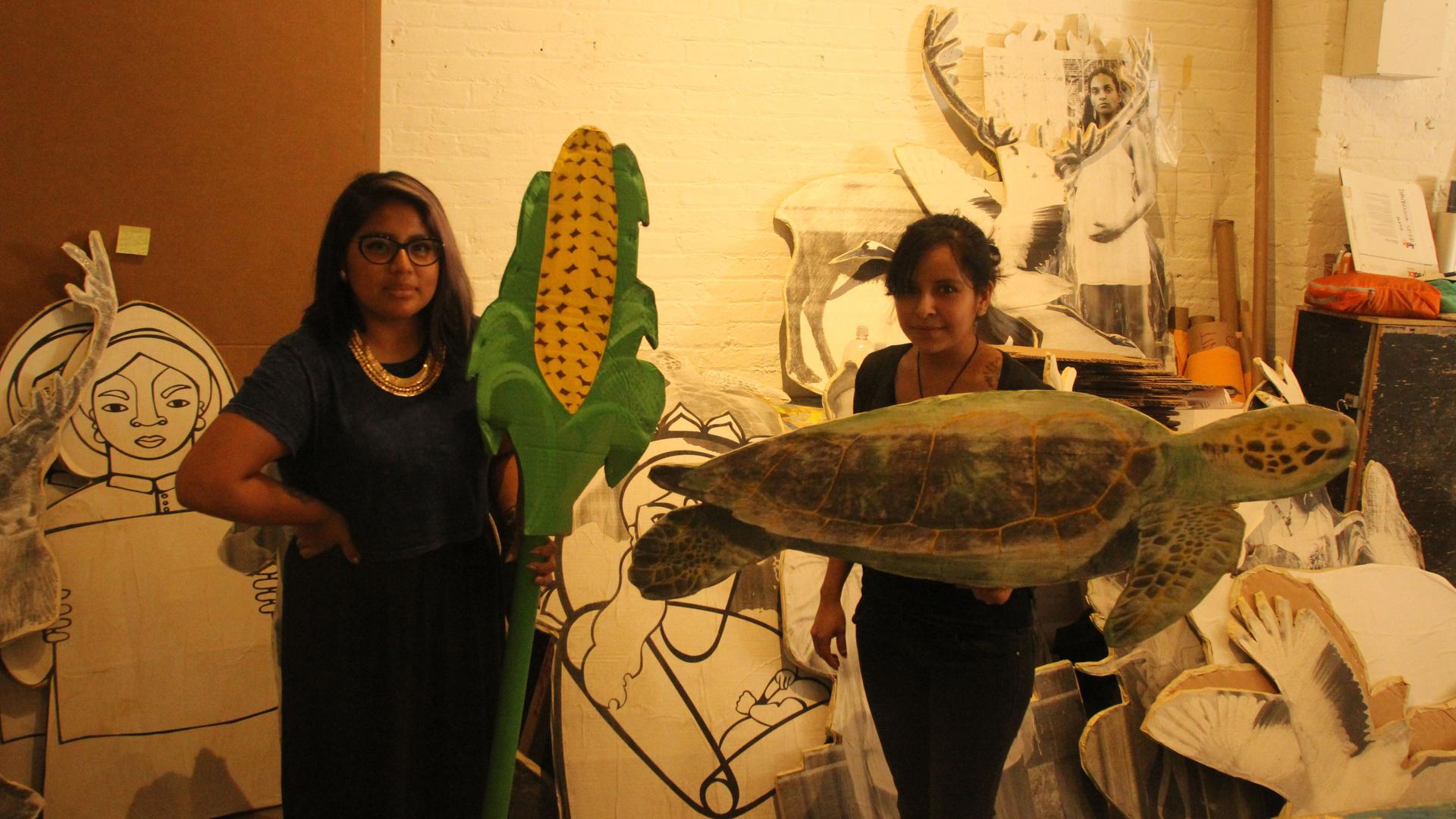Sonia Guinansaca and Susana Garcia of the activist group CultureStrike will be carrying these images of crops and animals threatened by climate change in Sunday’s People’s Climate March in New York City.
