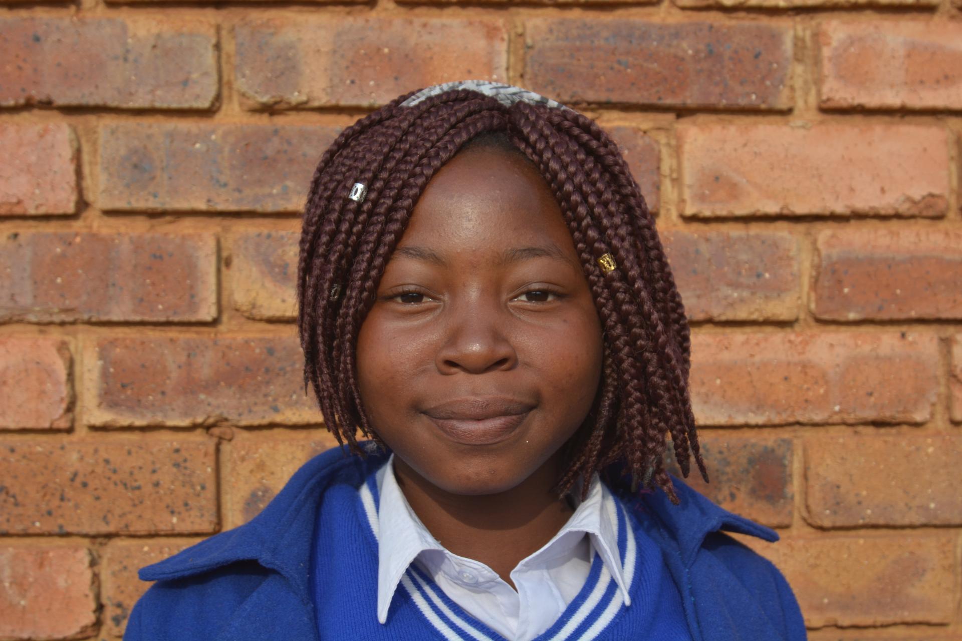 Close-up of the face of Nhlanhla, an HIV positive teen mom in South Africa.