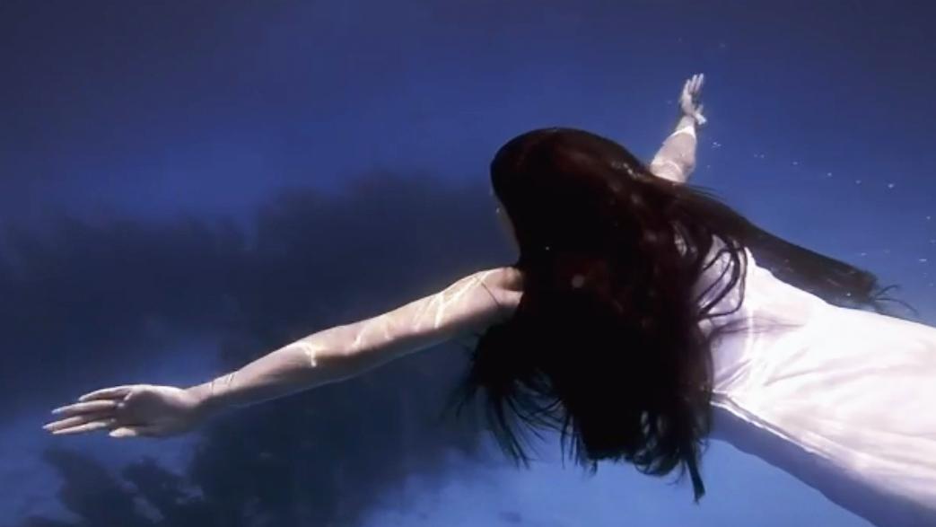 Dessa in her music video, "Sound The Bells"