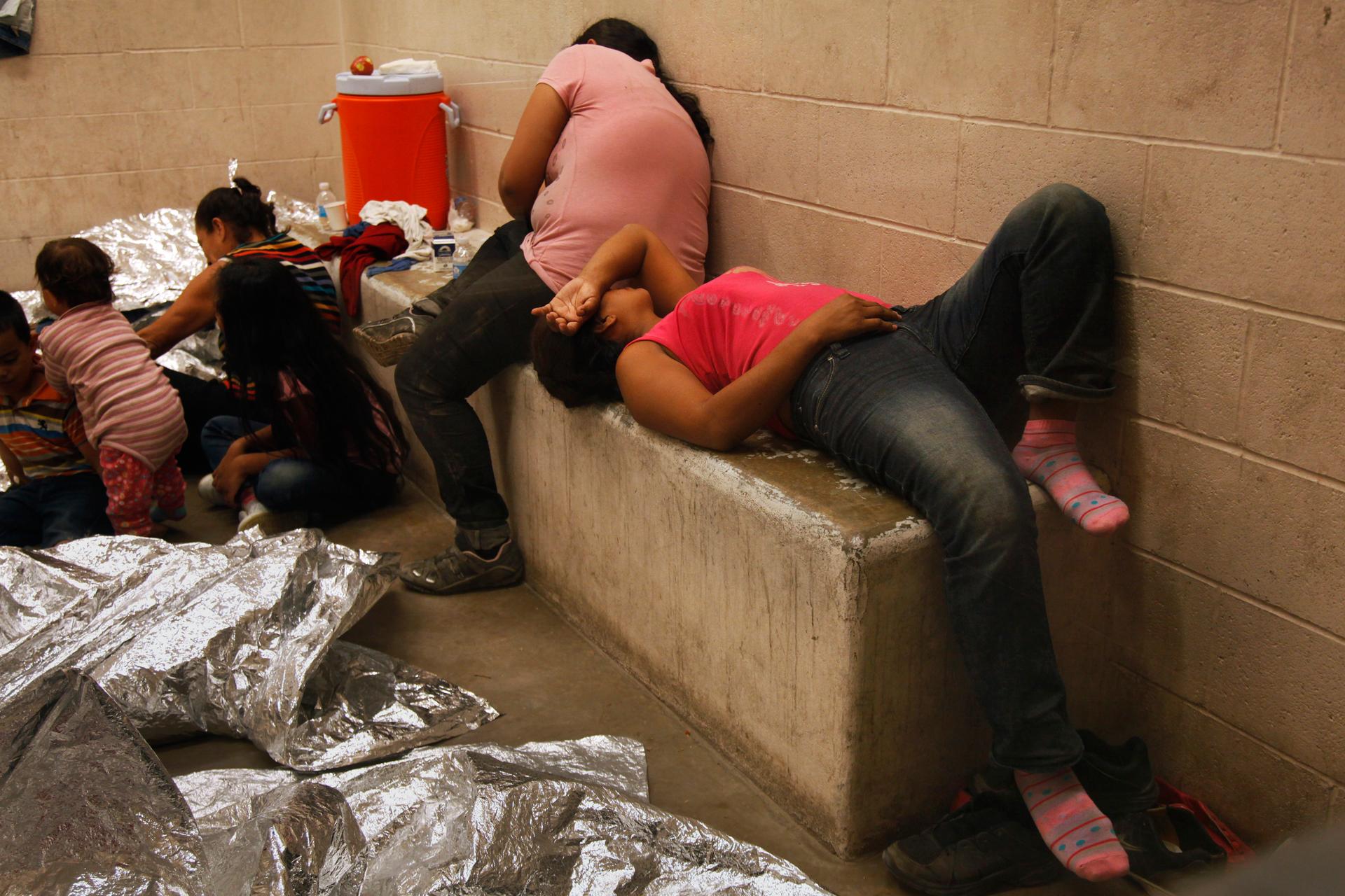 Immigrants who have been caught crossing the border illegally are housed inside the Border Patrol Station in McAllen, Texas where they are processed. More than 57,000 unaccompanied children have been apprehended at the southwestern border since October, m