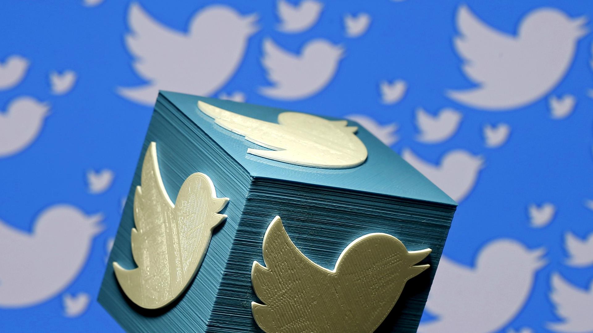 A 3D-printed logo for Twitter is seen in this picture illustration.