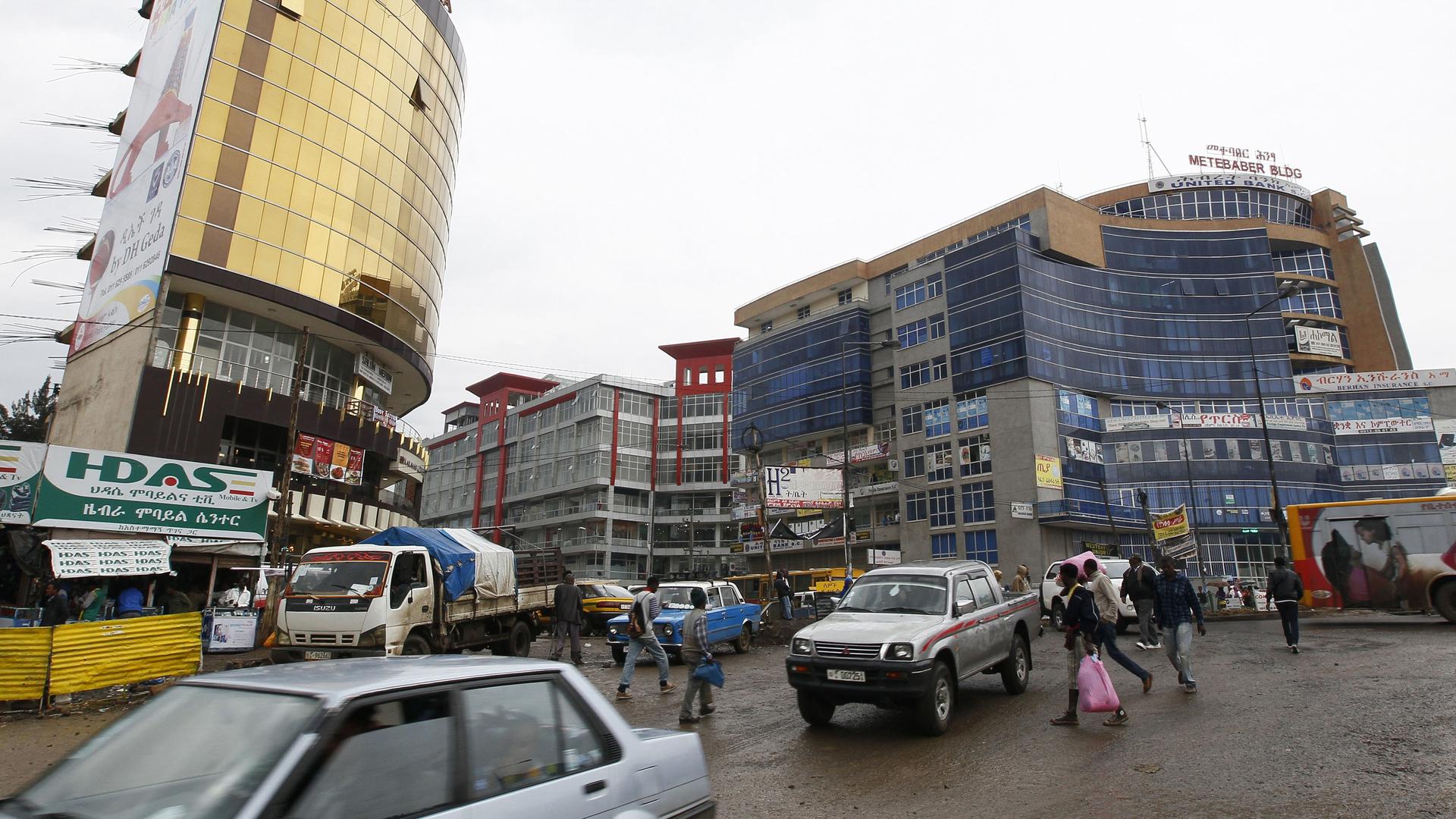 People walk through the streets of a shopping area in Addis Ababa.
