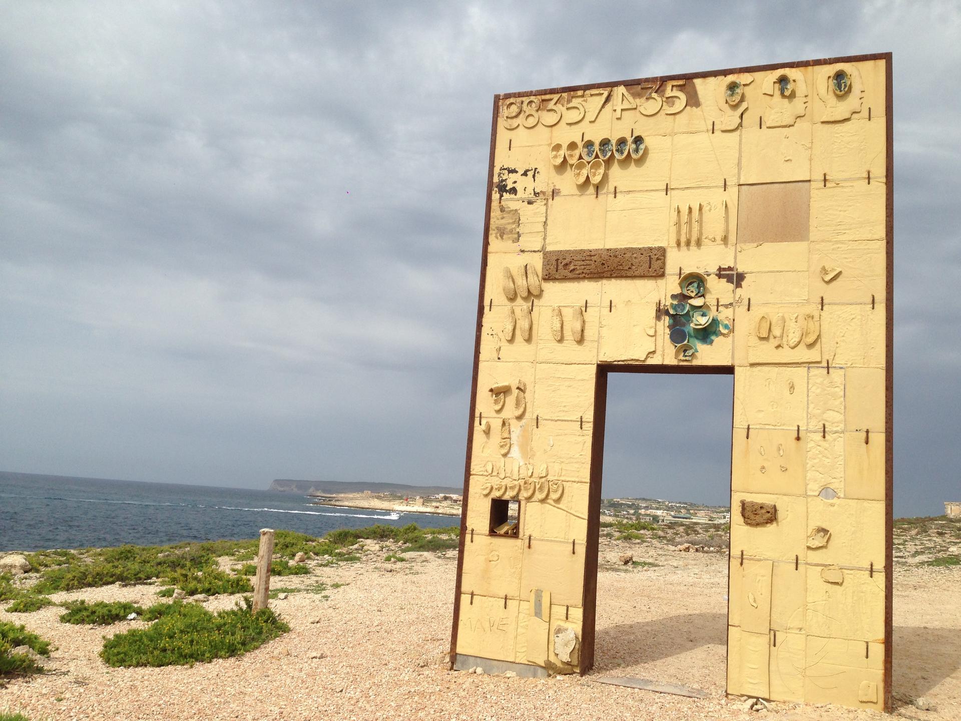 "The Door of Lampedusa, Door of Europe" underscores the situation of refugees who arrive on Lampedusa as the entry point to the rest of Europe.