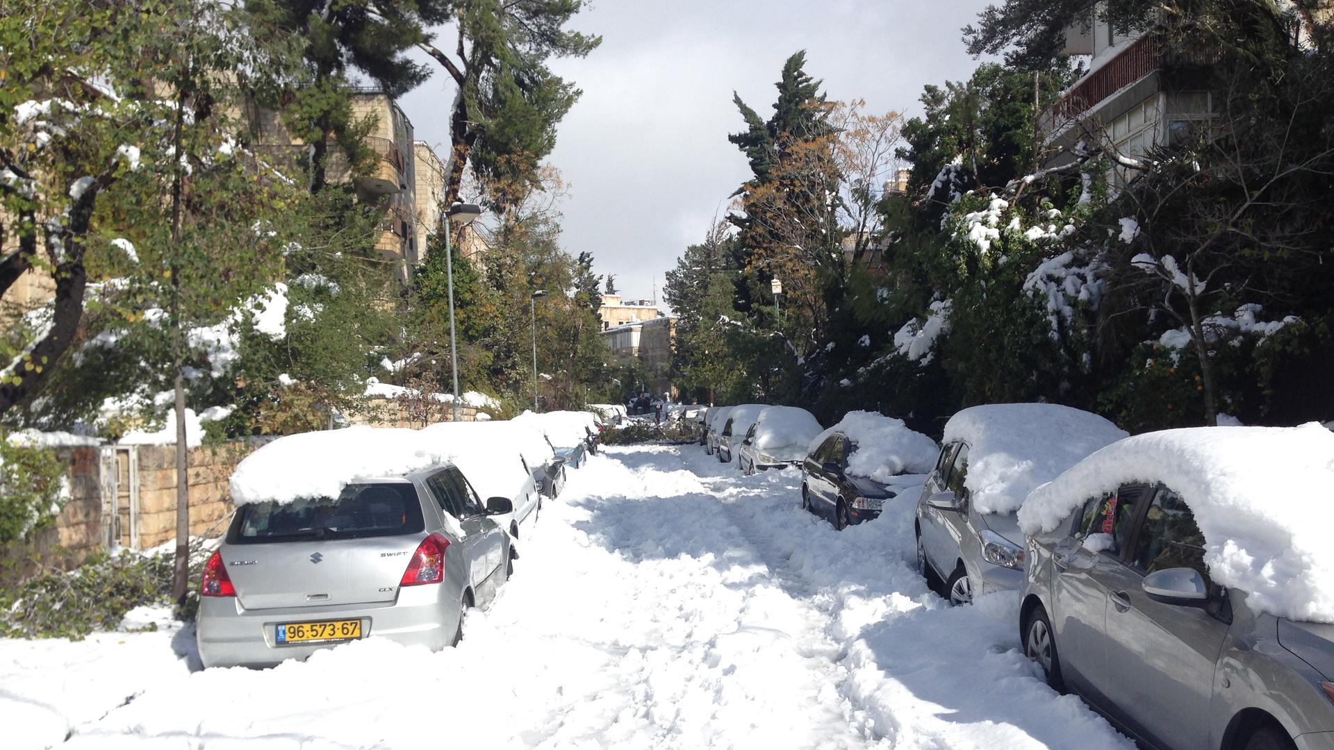 Cars were trapped for days during last year's snowstorm in Jerusalem.