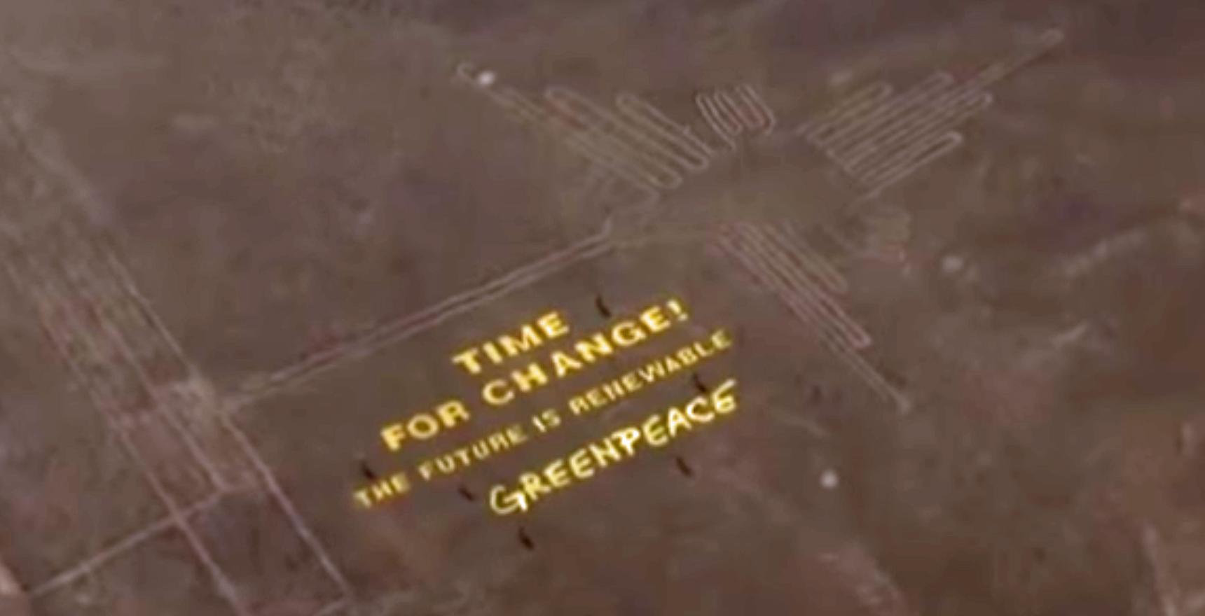 Greenpeace message next to Peru's Nazca Lines.