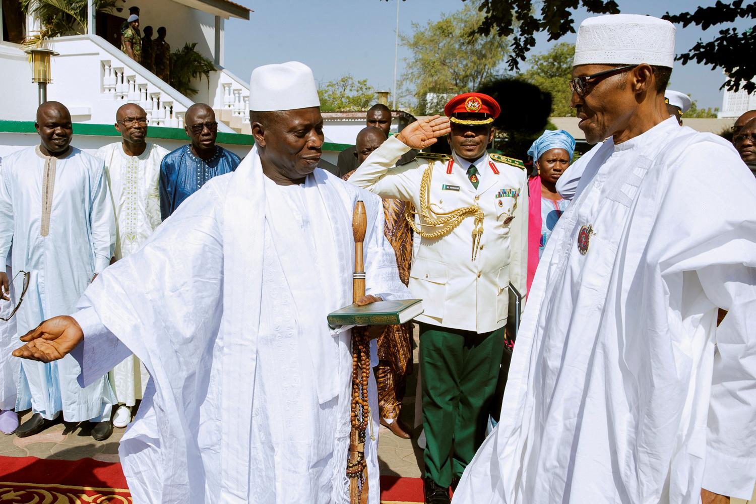 Gambia's President Yahya Jammeh welcomes Nigeria's President Muhammadu Buhari