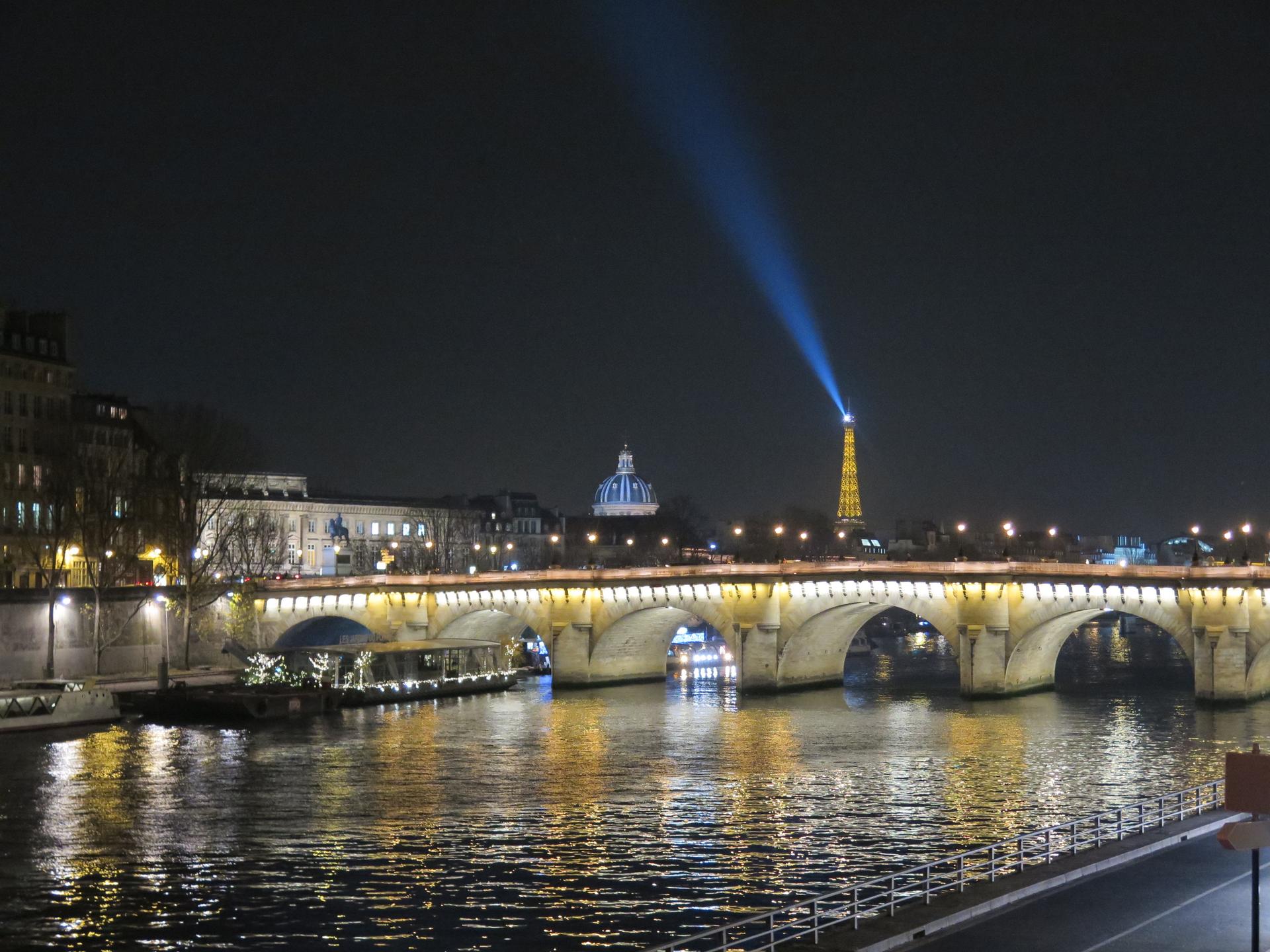 The Eiffel tower illuminated at night