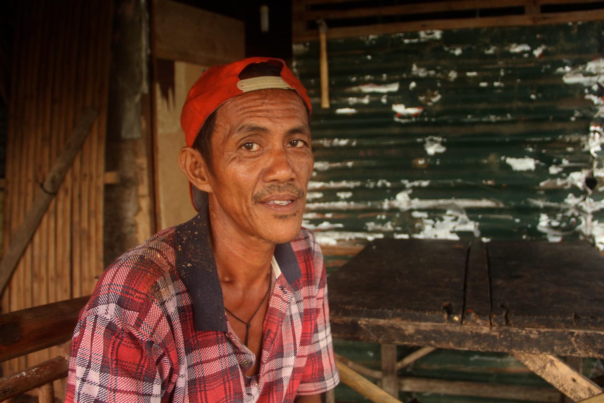 Farmer Felipe Parado Jr., 59, has collected the sap of coconut palms, to make wine, since he was a child.