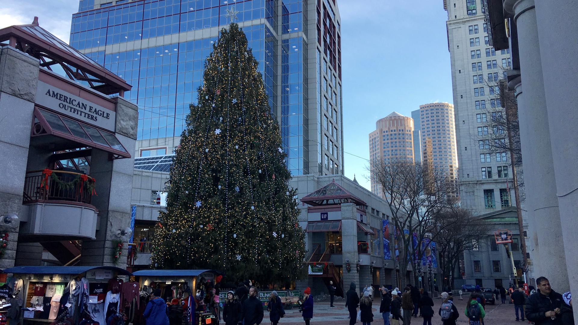 The Christmas tree at Faneuil Hall marketplace in downtown Boston is from Long Island, New York. But is it a religious symbol? Many people say, not really.  