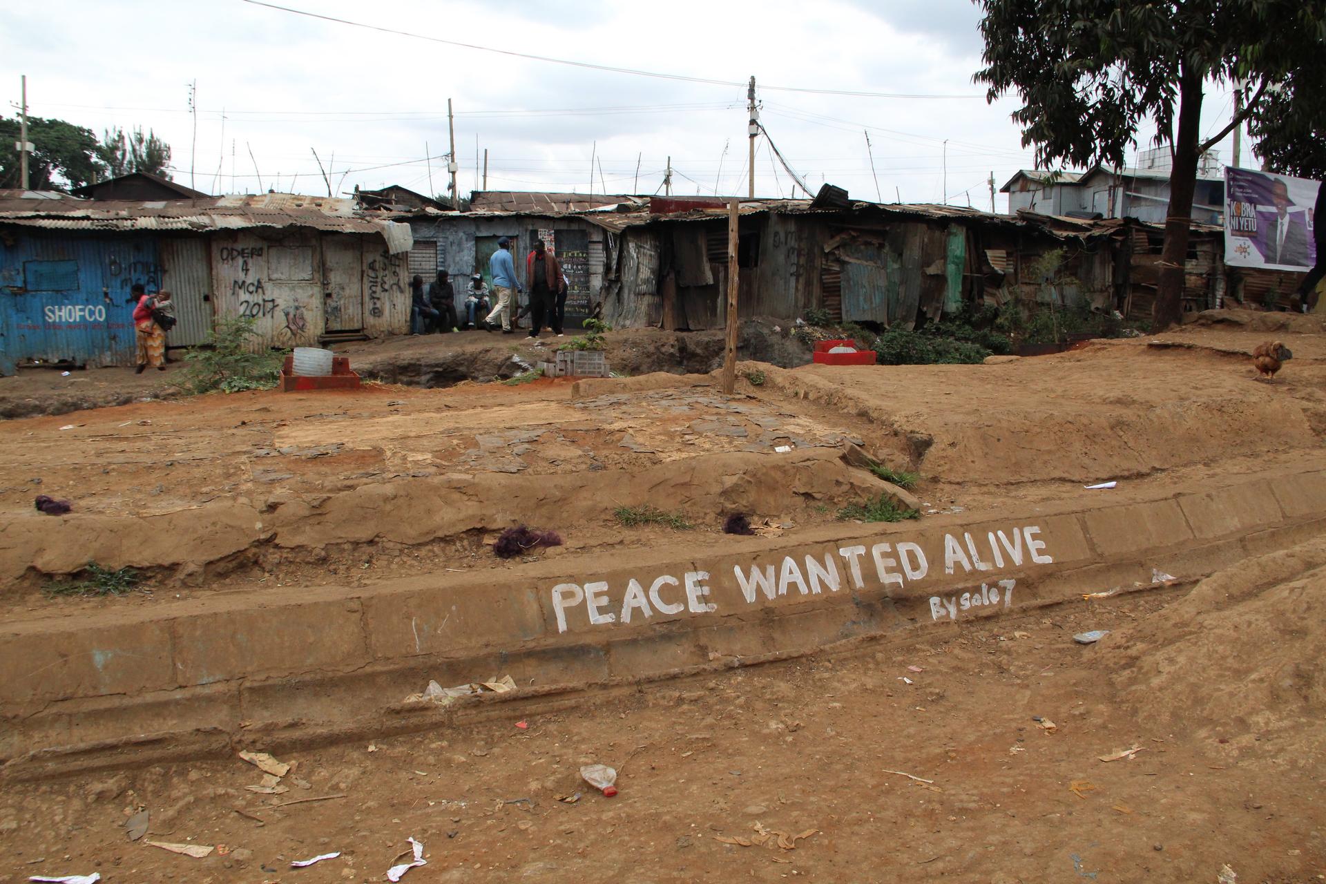 Peace messages by graffiti artist Solo7 adorn Nairobi's Kibera slum in the run-up to the election on August 8. 