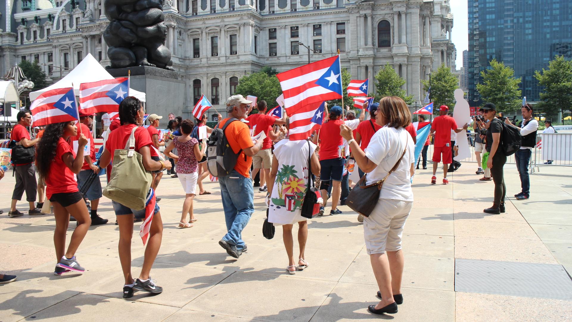 Puerto Ricans from across the country march near Philadelphia's city hall during the Democratic National Convention, July 25, 2016.