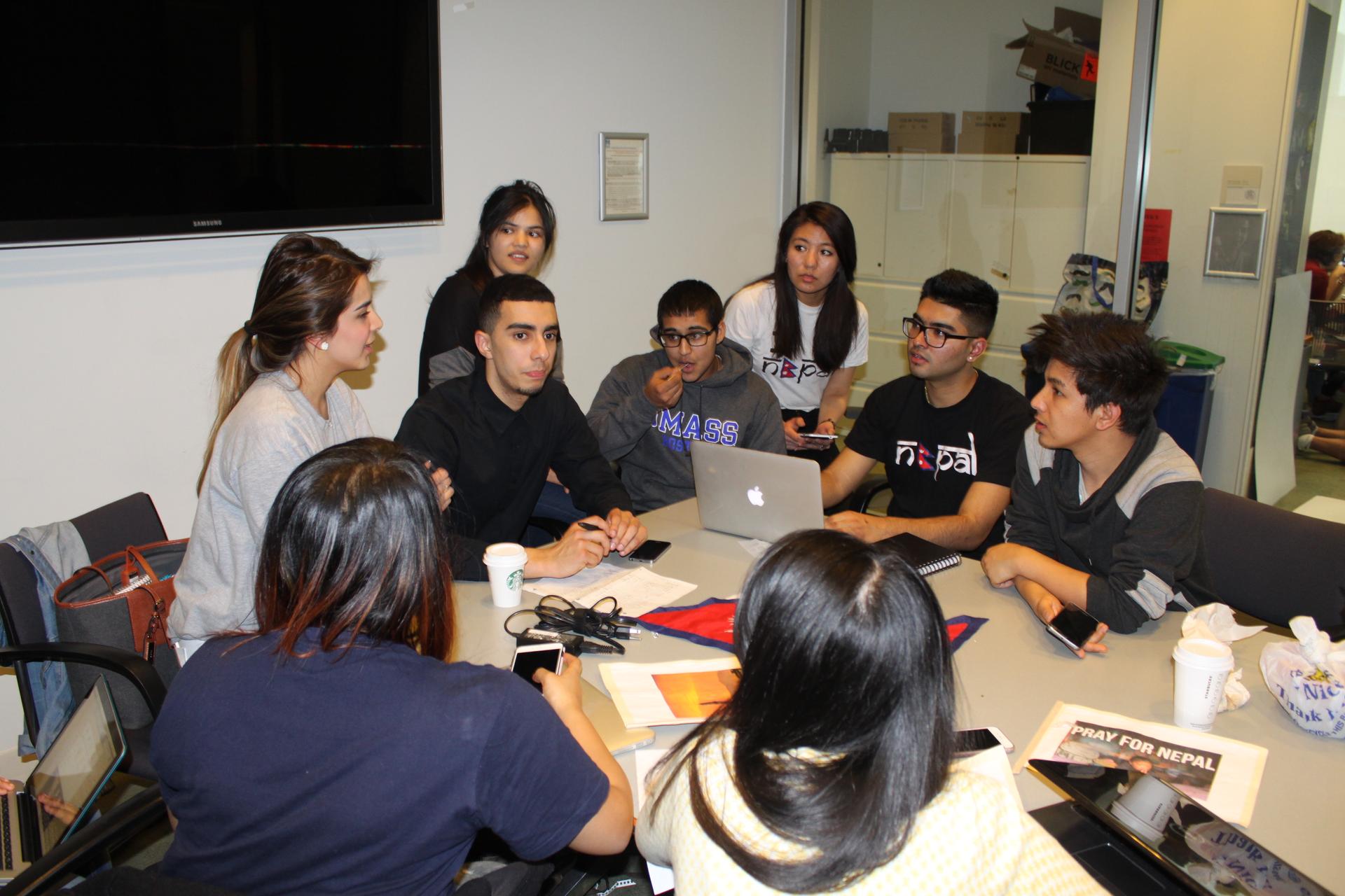 Nepali students at the University of Massachusetts Boston work on their fundraising plan for earthquake relief efforts