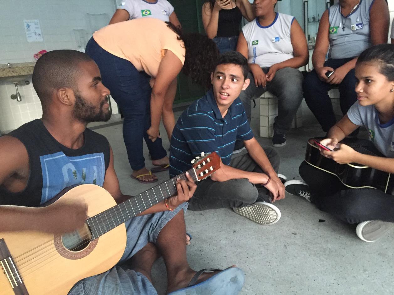 Teenage students look up lyrics to 1980s Brazilian punk tunes in sing-alongs at this occupied Rio de Janeiro high school.