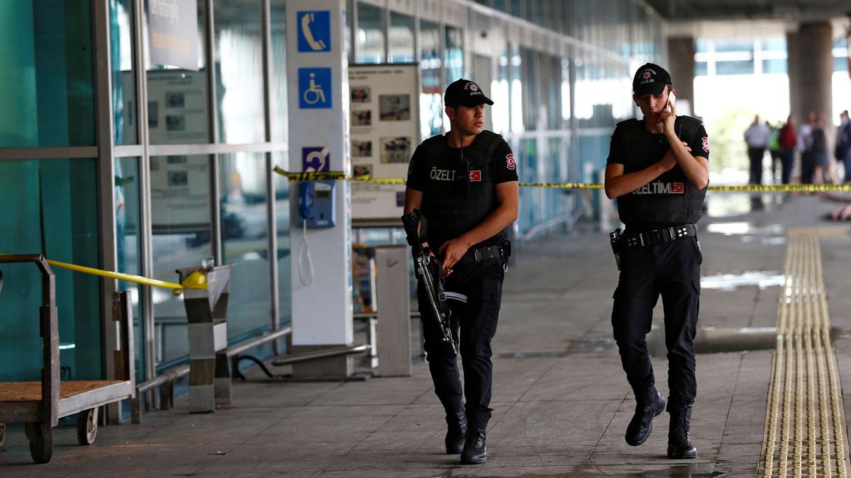Police officers patrol at Turkey's largest airport, Istanbul Ataturk, following Tuesday's attacks.