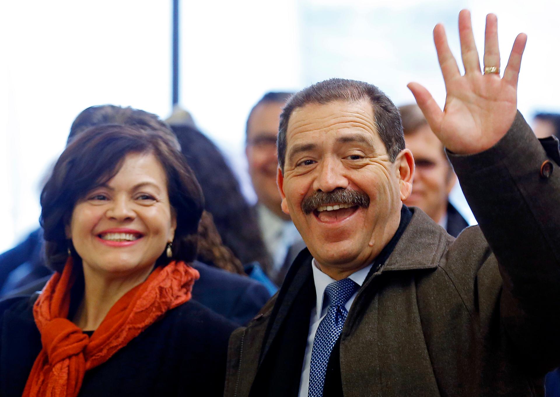 Chicago mayoral candidate Jesus "Chuy" Garcia and his wife, Evelyn, arrive at a restaurant for lunch on February 24, 2015, the day of the Chicago Democratic primary.