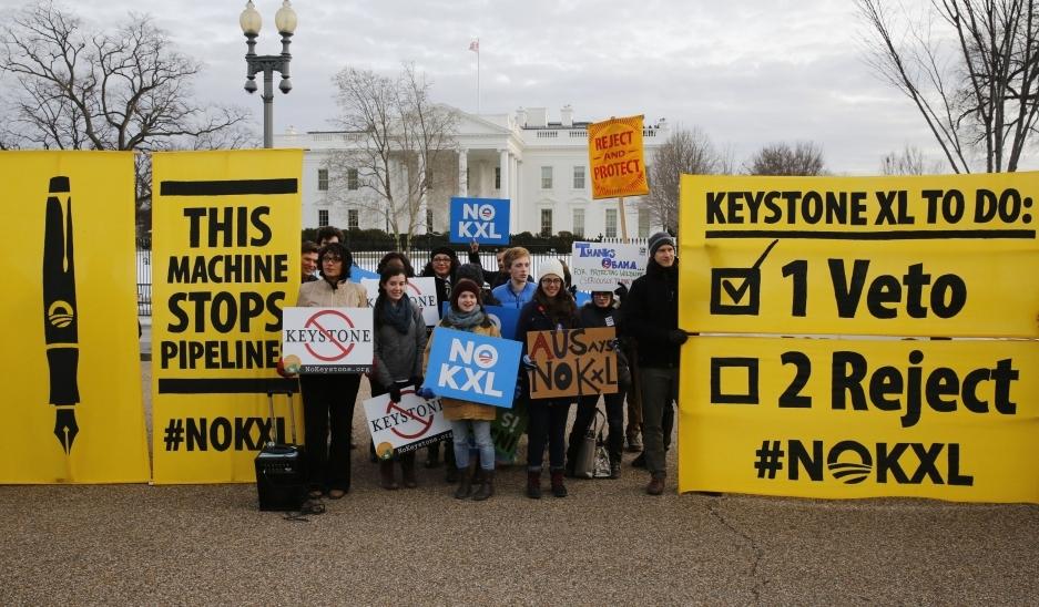 Opponents of the Keystone XL oil pipeline rally in front of the White House on February 24, 2015, the day President Barack Obama vetoed a bill circumventing administration review of the project and mandating its construction.