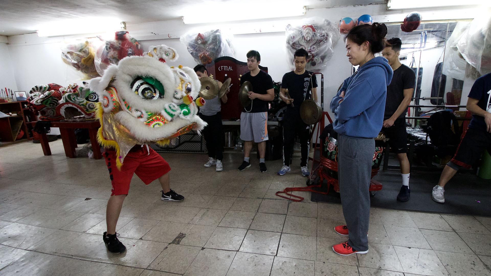 Kelly Wong is one of the lion dance instructors at the New York Chinese Freemasons Athletic Club. Originally founded as a fraternal society, the Freemasons were among the first troupes in Chinatown to train women to lion dance.