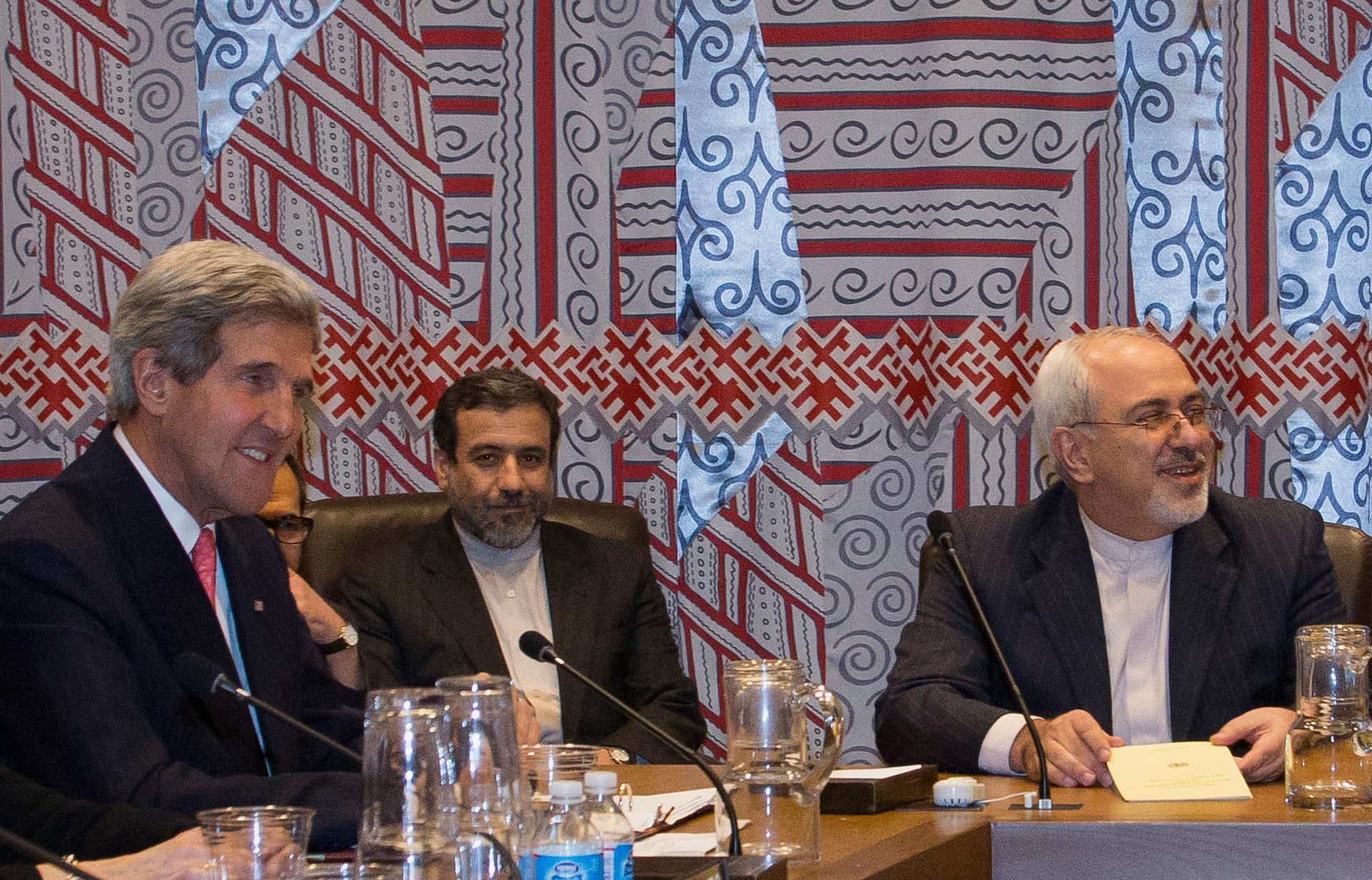 US Secretary of State John Kerry (L) and Iran's Foreign Minister Mohammad Javad Zarif (R) are seated during a meeting at the United Nations.