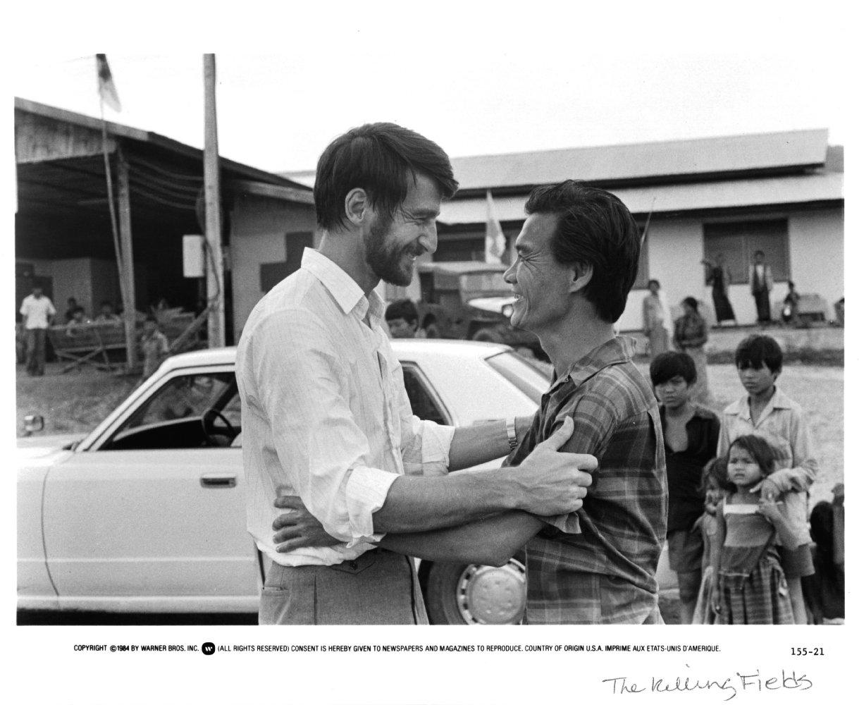 Still from Killing Fields showing actors Sam Waterston and Haing Ngor