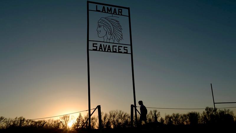Alina Balasoiu, a junior at Lamar High School, walks back to school after play in a soccer game in the fields behind the school. A bill going through the Colorado Legislature that would require panel approval for mascot and team names. Several Native Amer