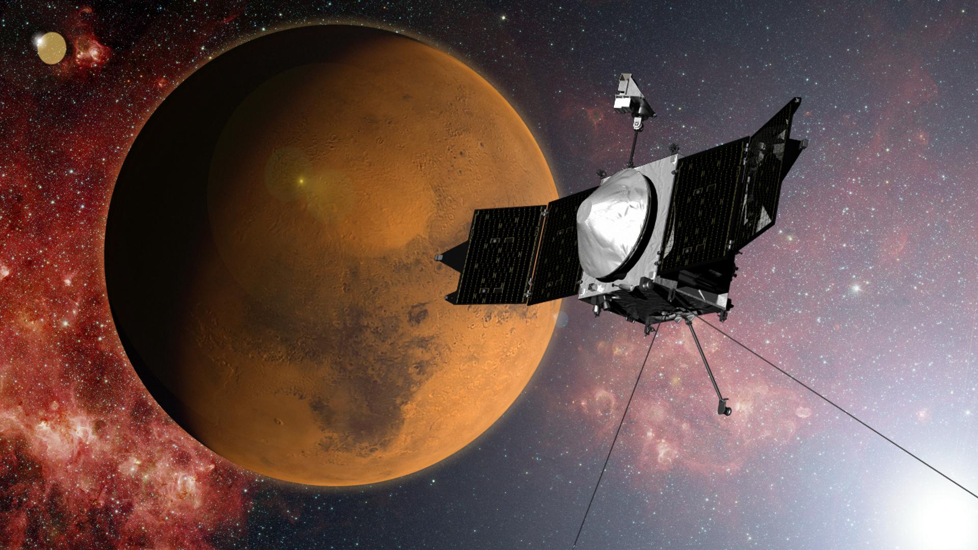 An artist's concept of NASA's MAVEN spacecraft approaching Mars. The probe entered Mars orbit on September 21.