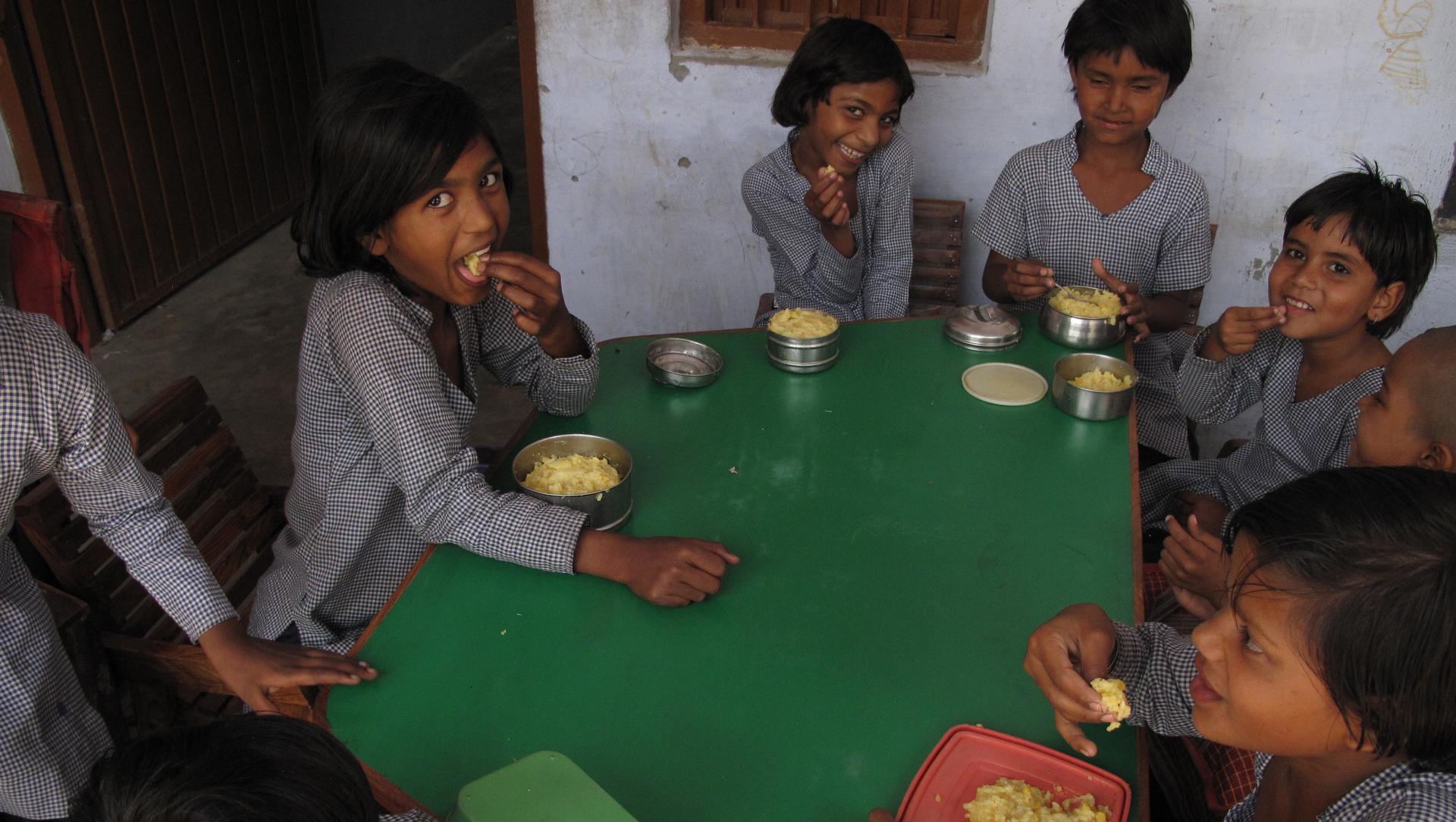 Girls eating their lunch at a government school in Bawani Khera village, in south central Haryana. 