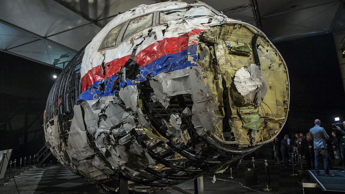 The reconstructed wreckage of the MH17 airplane is seen after the presentation of the final report into the crash.