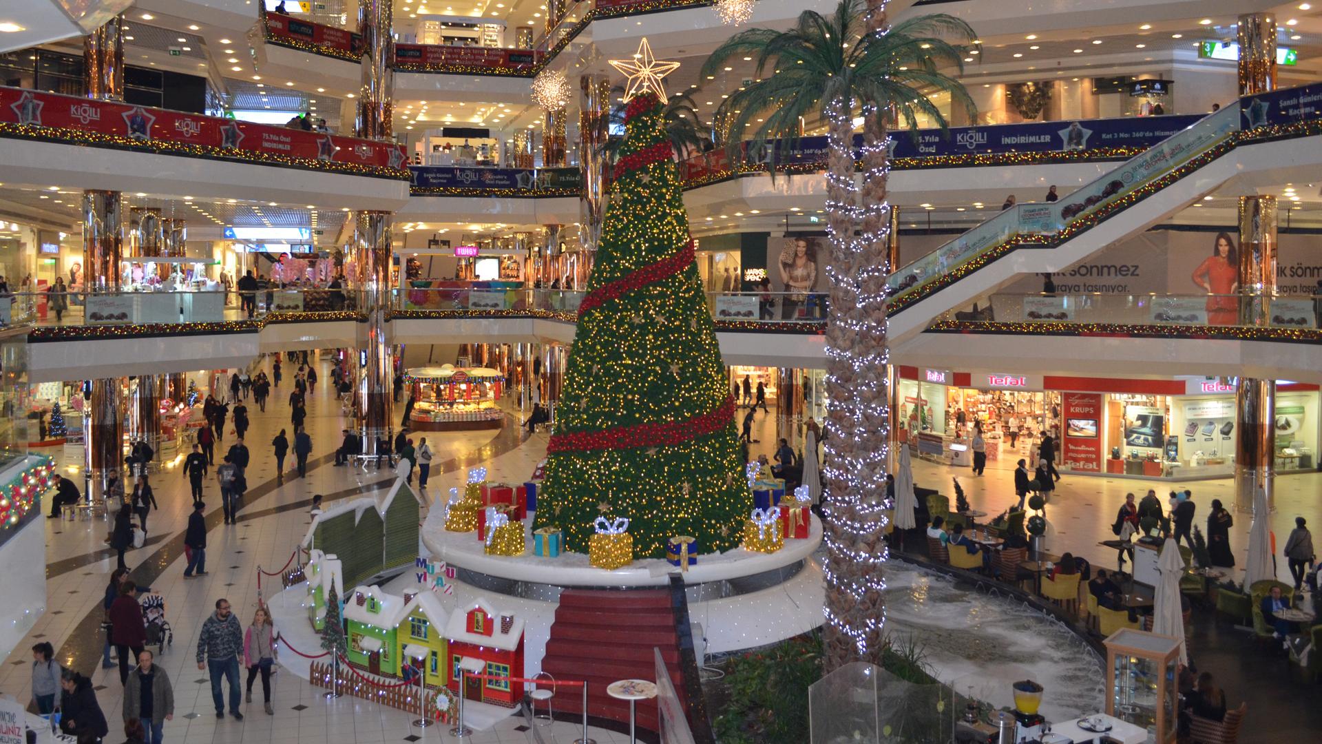 A massive evergreen tree towers over the atrium in one of Istanbul’s largest malls.