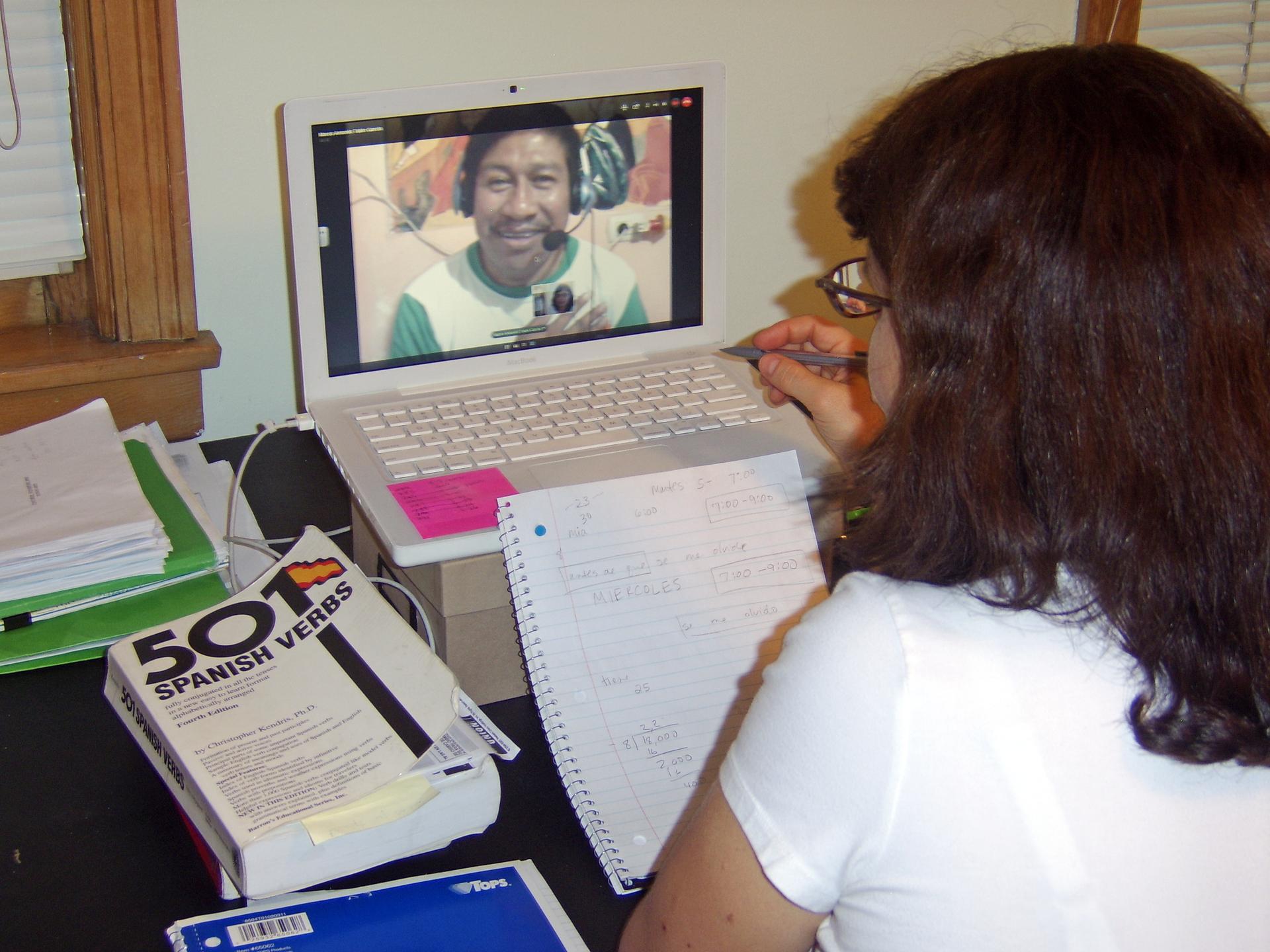 Marco Antonio Tabin Garcia, in Antigua, Guatemala, Skypes with a student in Chicago. 