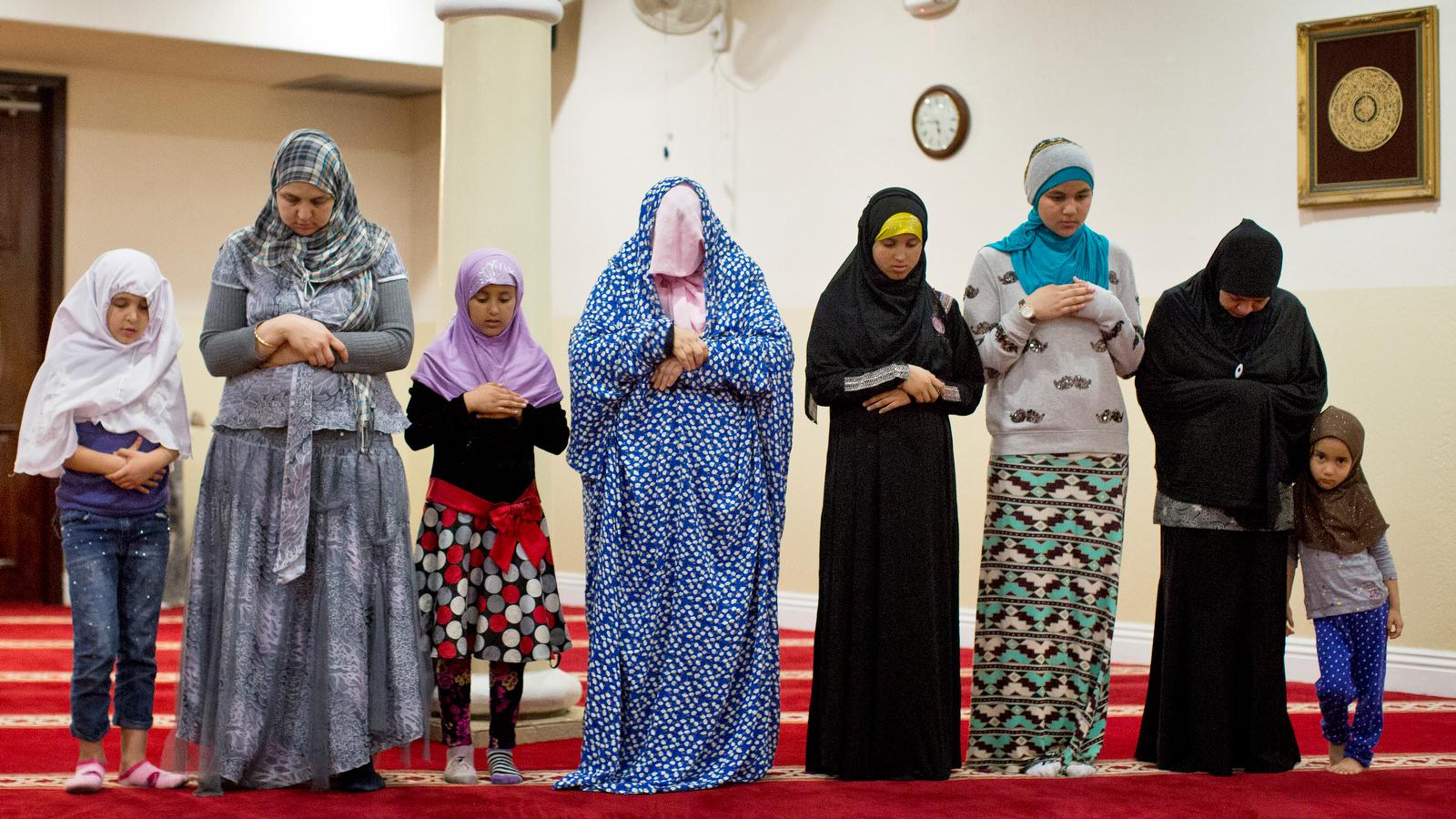 Women take part in the Maghrib prayer just after sunset at 5:34 p.m. at West Coast Islamic Society in Anaheim on Feb. 12. The prayer is the fourth of five daily prayers.
